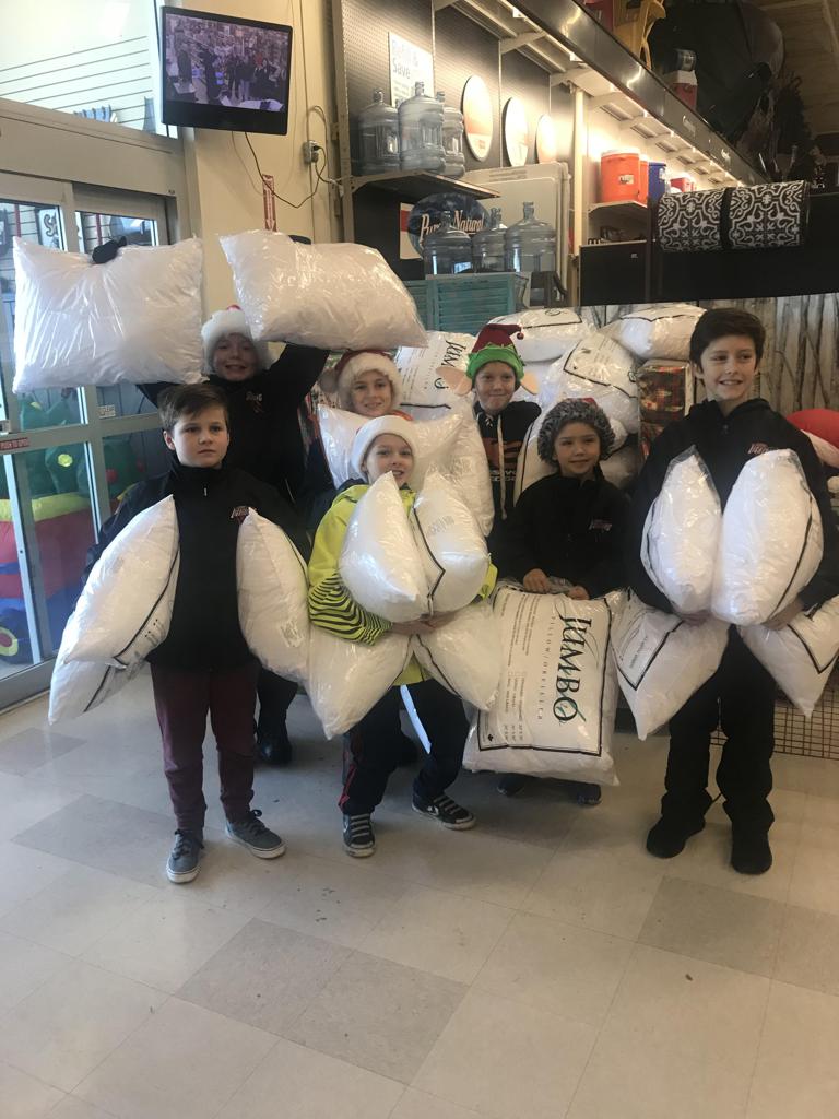 Christmas is the time for giving and our Atom Tier 2 Red team were busy shopping for pillows to donate to to the Airdrie Lioness Club. AMHA is proud of these young athletes on and off the ice. 